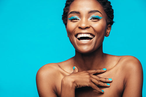 Beautiful smiling woman with vivid makeup