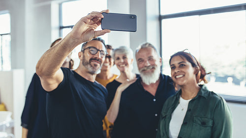 Startup team taking selfie