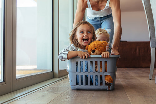 Cute family playing together at home