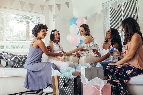Female friends attending baby shower