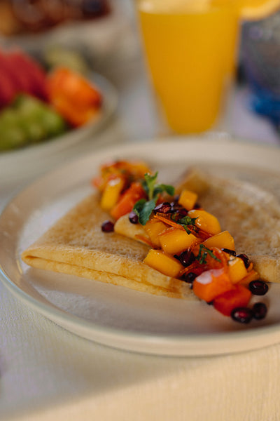 Delicious pancake with fresh fruit served as a luxury breakfast in a hotel