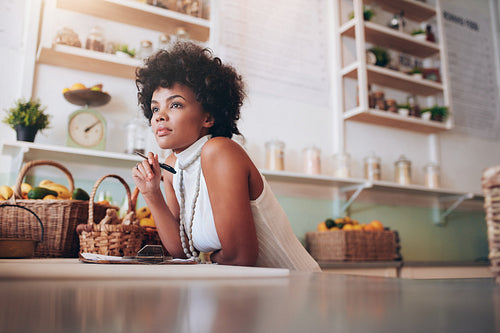 Young african female juice bar owner
