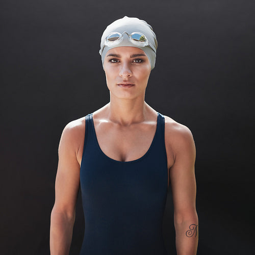 Female fitness model in swimsuit