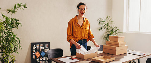 Drop shipping business owner working at home office