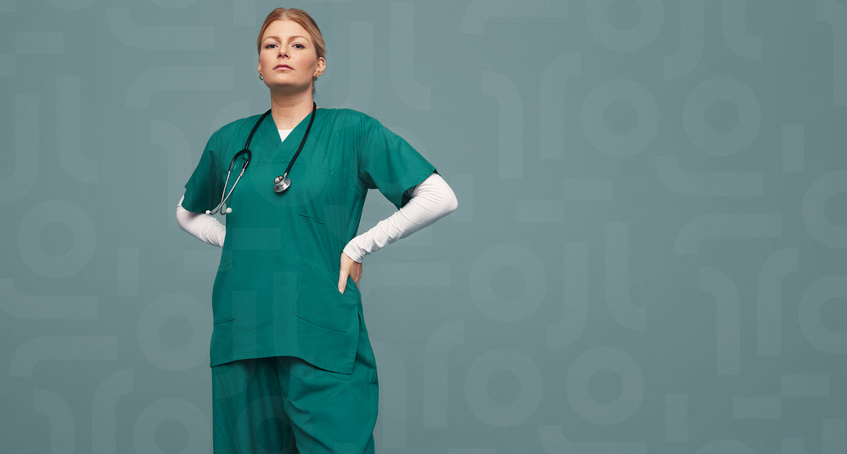Young female doctor wearing green scrubs in a studio – Jacob Lund ...