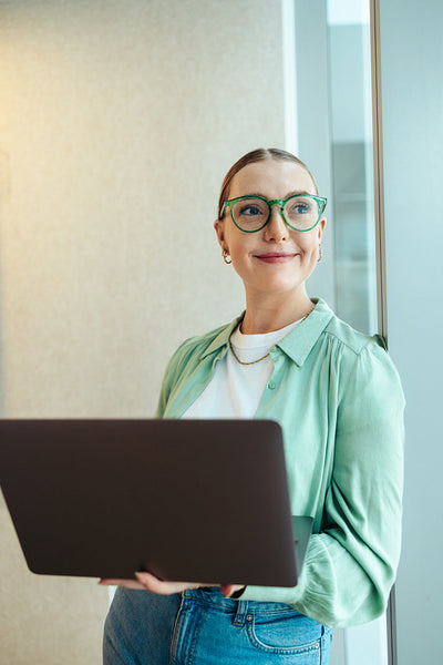 Confident woman in a startup environment