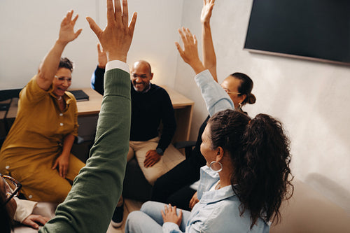 Team members bonding during a group activity in the office environment