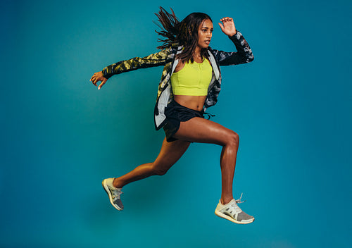 Fitness woman doing running exercise