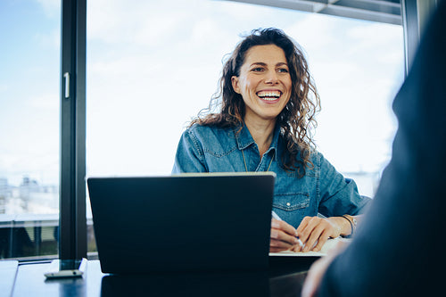 Businesswoman taking interview of a job applicant