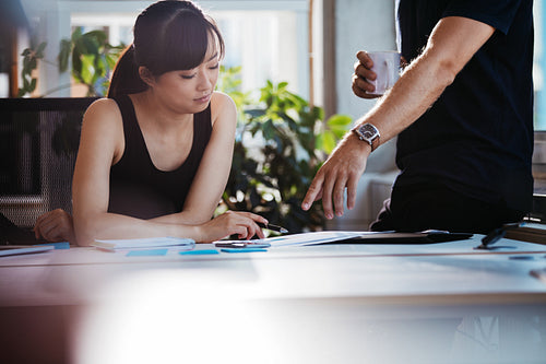 Executives discussing new business ideas in office