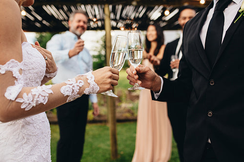 Wedding toast by newlywed couple