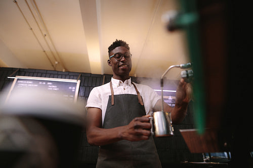 Barista preparing coffee at a coffee shop