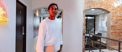 Businessman standing in a modern office