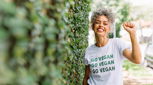 Vegan activist advocating for veganism outdoors