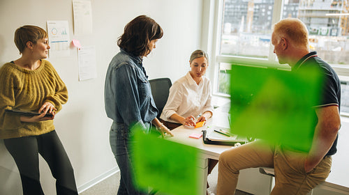 Business people discussing new ideas in meeting