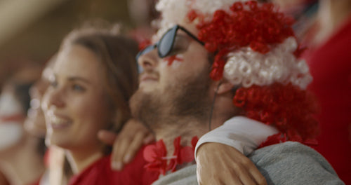 England football fans cheering together in stadium