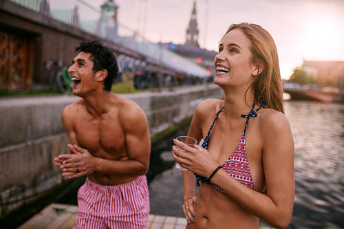 Young people having fun on a summer day at the lake