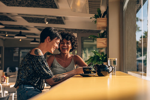 Friends having fun at coffee shop