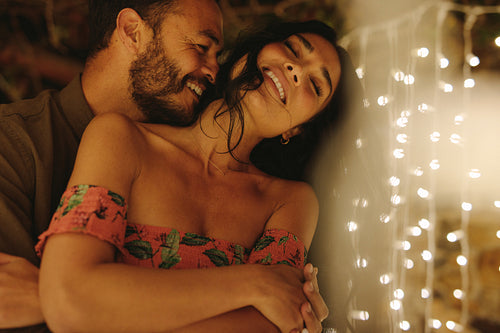 Loving young couple at a party