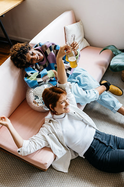 Colleagues sharing a light moment in a co-working space