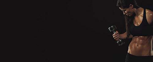 Female fitness model exercising