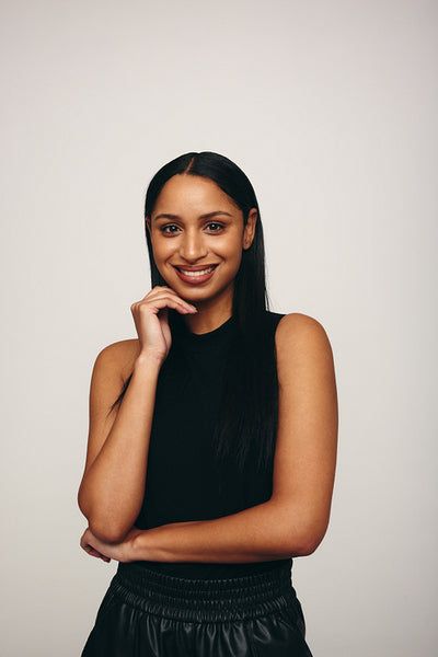 Happy young woman smiling at the camera