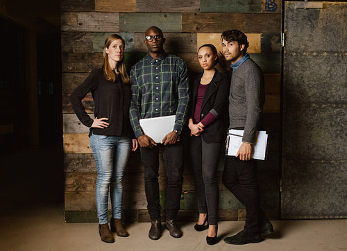 Portrait of young professionals standing together