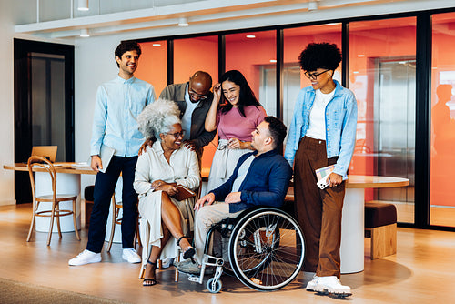 Group of friends and colleagues in a modern office
