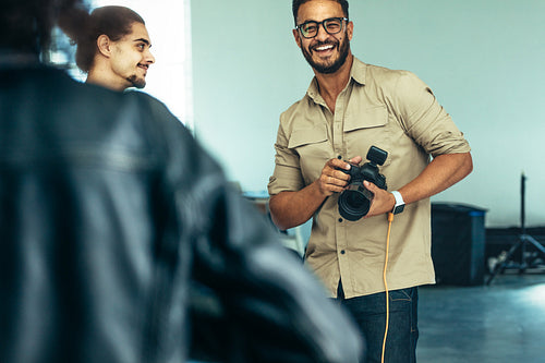 Photographer smiling during a photo shoot