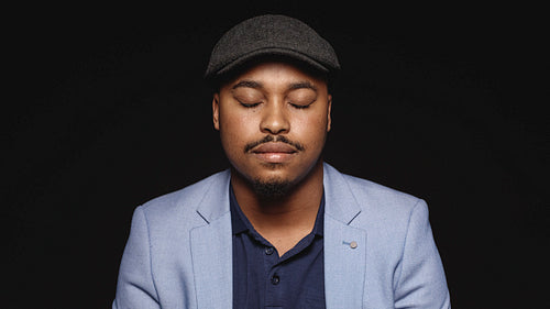 Man with eyes closed