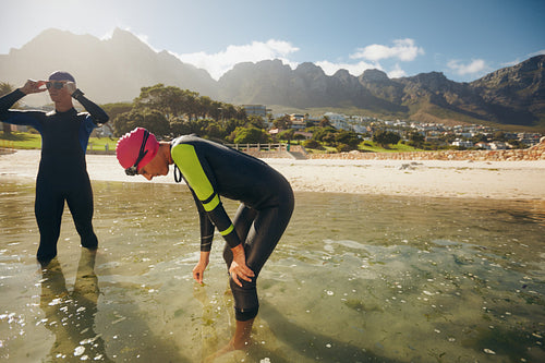 Athletes resting after triathlon training session