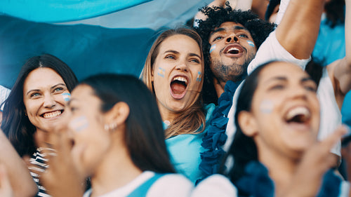 Football supporters cheering argentinian national team