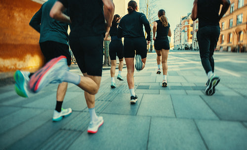 The city sets the scene as running becomes a shared group workout