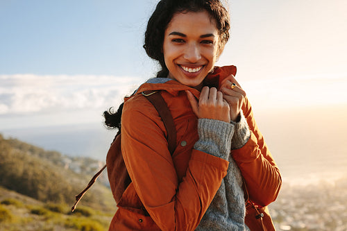 Woman shivering outdoors on a winter day