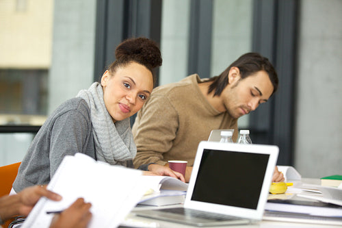 Young woman studying in library