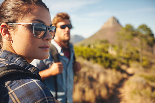 Young couple hiking in countryside