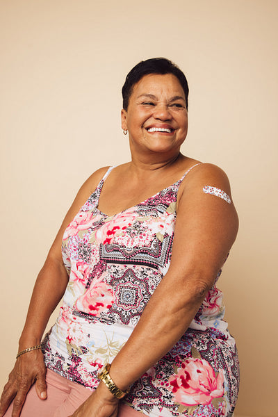 Woman smiling after inoculation