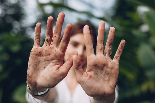Woman hands after garden work and landscaping