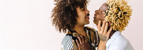 Romantic gay lovers looking at each other