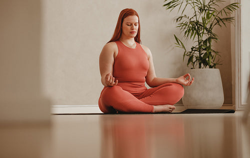 Yoga meditation in fitness studio