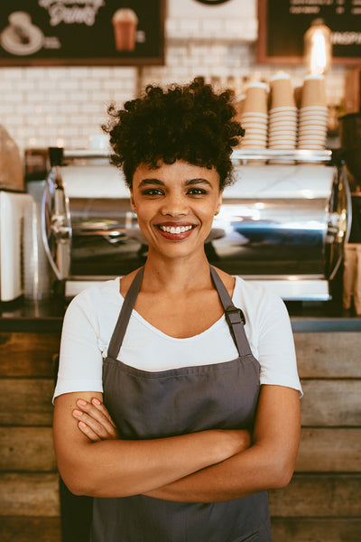 Proud coffee shop owner
