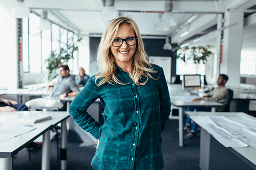 Attractive businesswoman in casuals at modern office