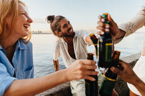 Friends enjoying a sunset gathering at Mureta Da Urca