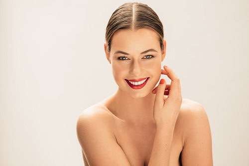 Pretty young woman with perfect skin