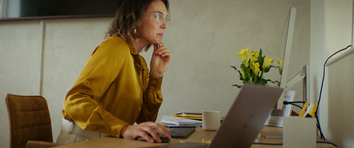 Focused businesswoman working at her desk in the office