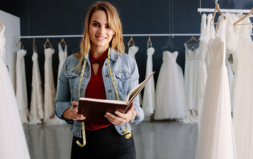 Woman working in bridal boutique