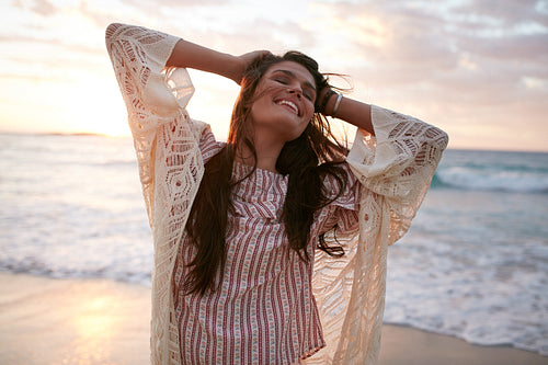 Smiling young woman enjoying her summer vacation