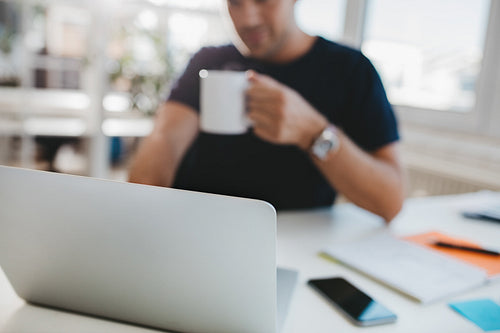Business man work desk with focus on laptop