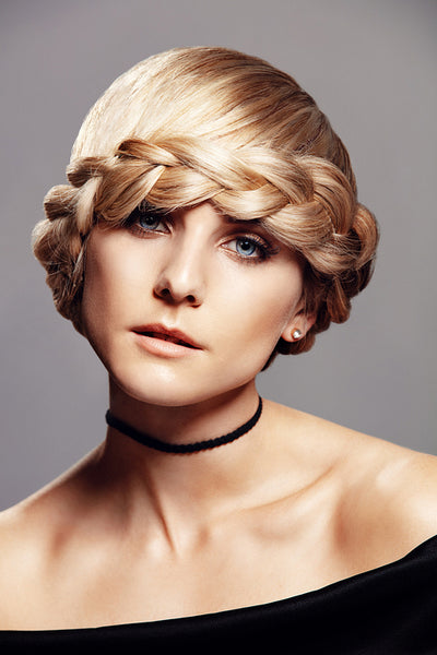 Beautiful blonde woman with braid hairdo