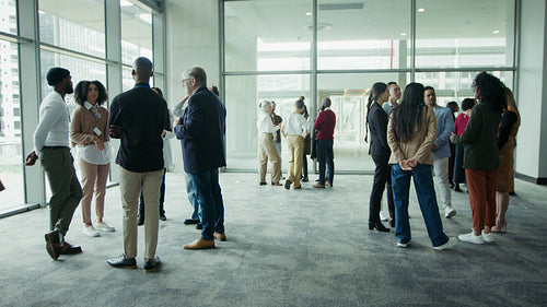 People gathering and talking at event
